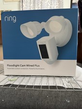 New, never opened  Ring Floodlight Cam Plus Outdoor Wired 1080p Camera White