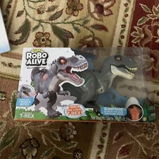 ZURU Robo Alive T-Rex Robotic Pet with Dino Sounds and Glow Scars