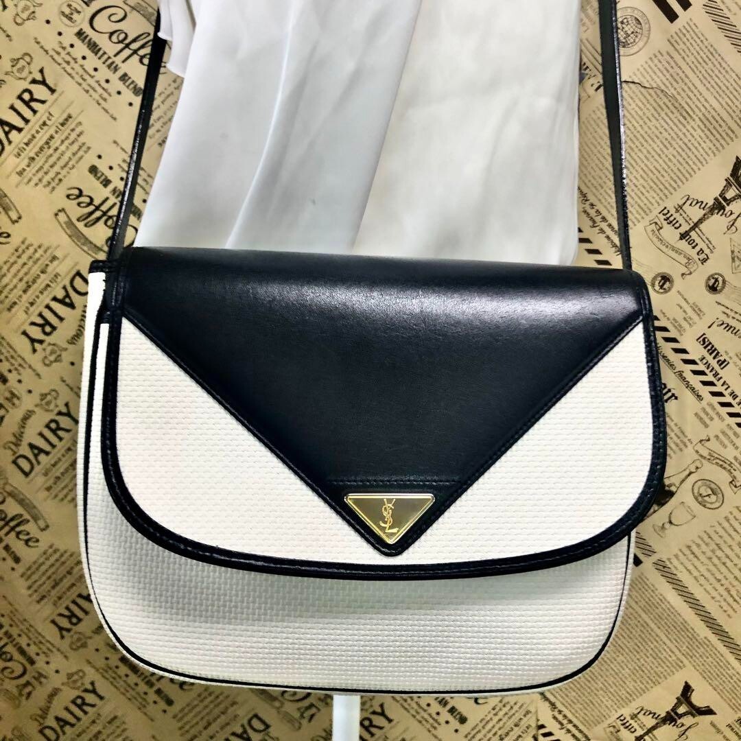 Borsa a tracolla Yves Saint Laurent pochette YSL bianca tela nera FL389 302 magnete