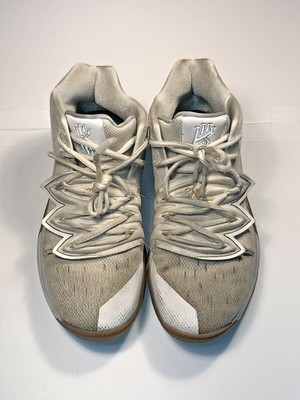 white and gold kyrie 5