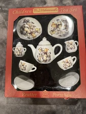 Porcelain children's tea set by M.J. Hummel manufactured by Reutter Porzellan