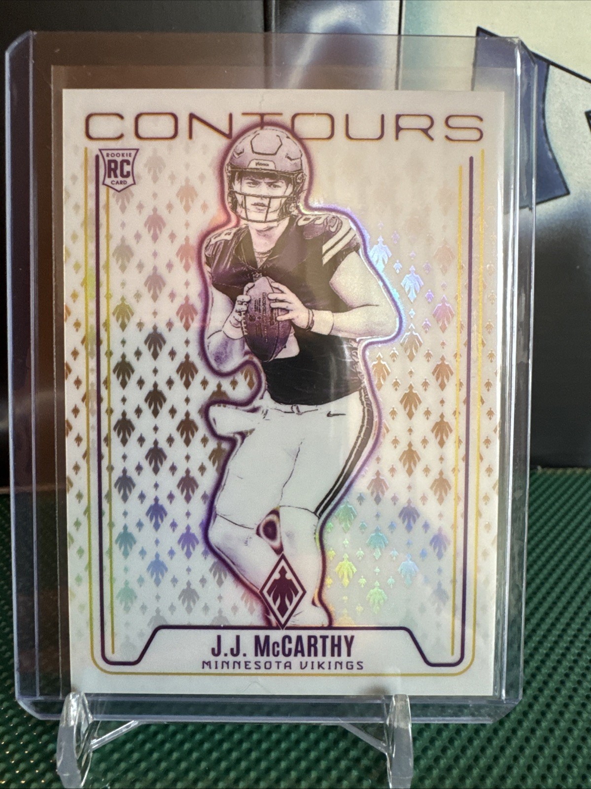 2024 Panini Phoenix - Contours J.J. McCarthy #CON-JMY Bronze /75 (RC)