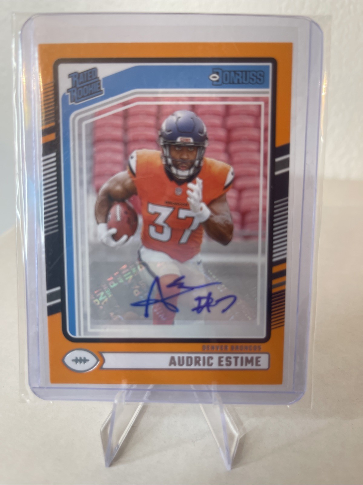 2024 Panini Donruss - Rated Rookie Audric Estime #335 Orange Autographs (AU, RC)
