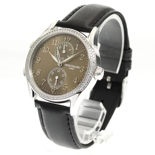 Patek Philippe — Patek Philippe Travel Time 7134G 35mm WG Brown Dial Hand-Winding Watch #C1436