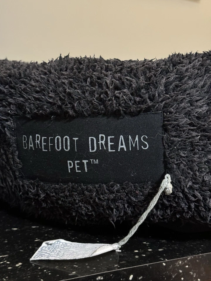 Cama redonda negra para mascotas Barefoot Dreams CozyChic usada Foto 3 de 4