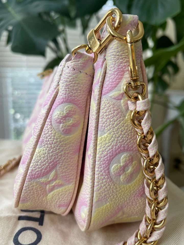 Louis Vuitton Empreinte Cuero Multi Pochette, StarDust (Rosa y Amarillo) Foto 2 de 4