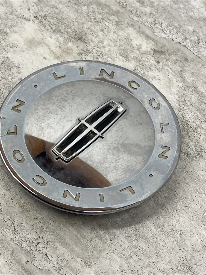 Tapa central de llanta de aleación Lincoln LS 2000-2006 6W13-1A096-AD OEM DESCOLORIDA Foto 2 de 4