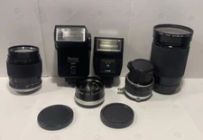 Lot Of Camera Lenses And Flashes. Vivitar 2800, Quantaray QA25, YUS Auto & More