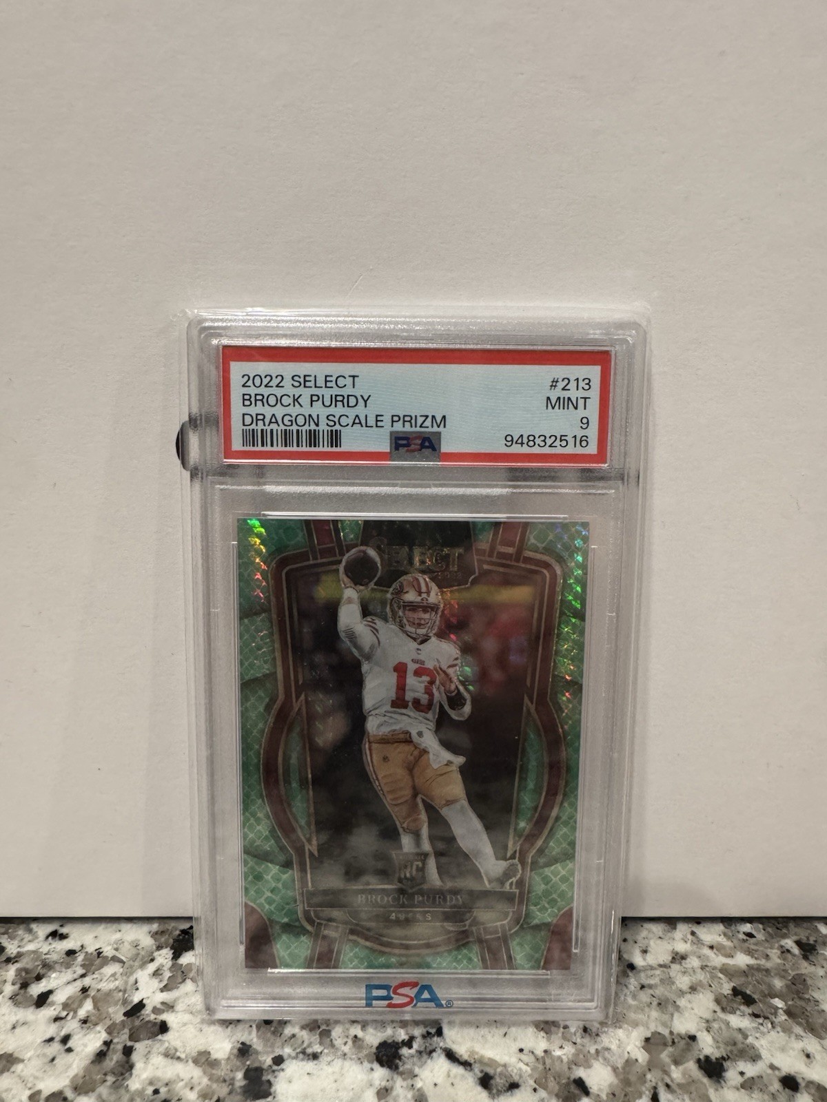 2022 Panini Select - Club Level Brock Purdy #213 Dragon Scale Prizm /89 (RC)