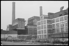 Exterior the Packard Motor Co. factory with smokestacks, Detroit, Michigan /