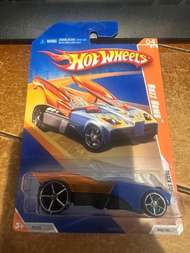2009 Hot Wheels Track Stars Buzz Bomb #58 Orange/Blue