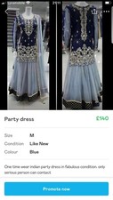 Asain wedding party  wear in navy blue with grey colour.Dress have beautiful hea