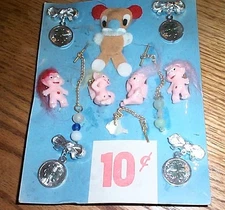 Vintage display card 10c charms and toys #jd540