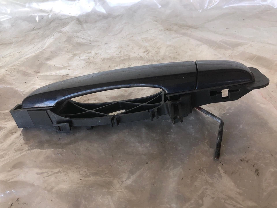 Cadillac SRX 2007 manija de puerta exterior trasera izquierda lado del conductor izquierda usada Foto 2 de 4