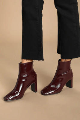 mid heel patent boots