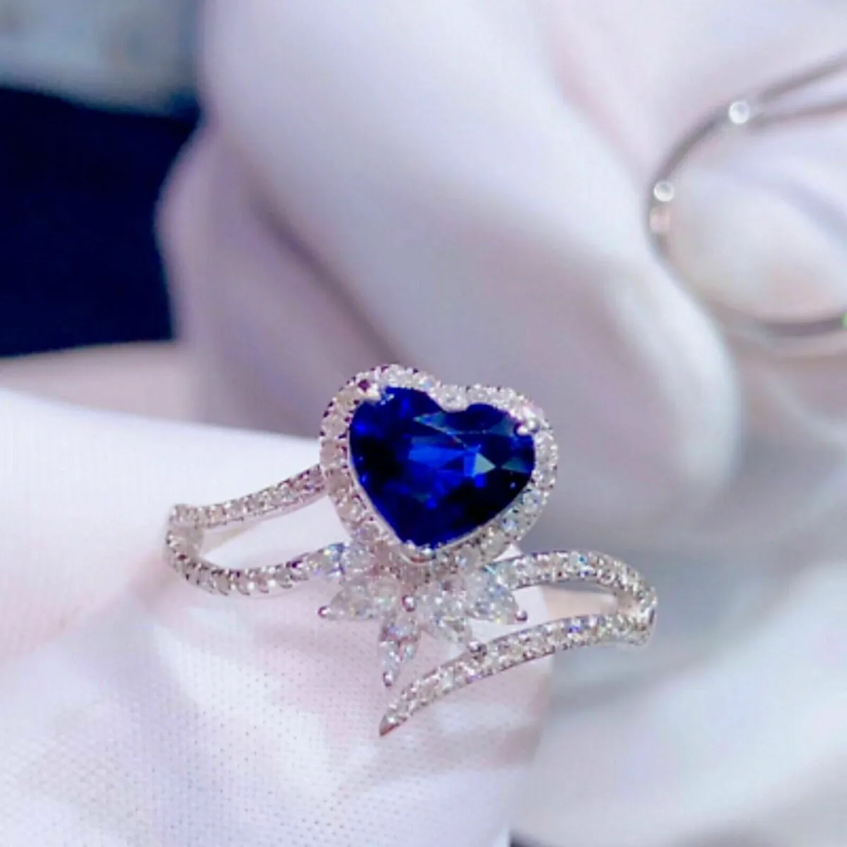Lovely heart shaped sapphire and diamond ring.GIA certified -
