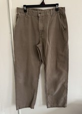 vintage Carhartt duck canvas dungaree fit work pants in a beige/tan size 34/30