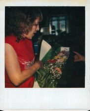 Old Vintage Photo COLOR POLAROID SOLO WOMAN HOLDING FLOWERS INSTANT PHOTOGRAPH