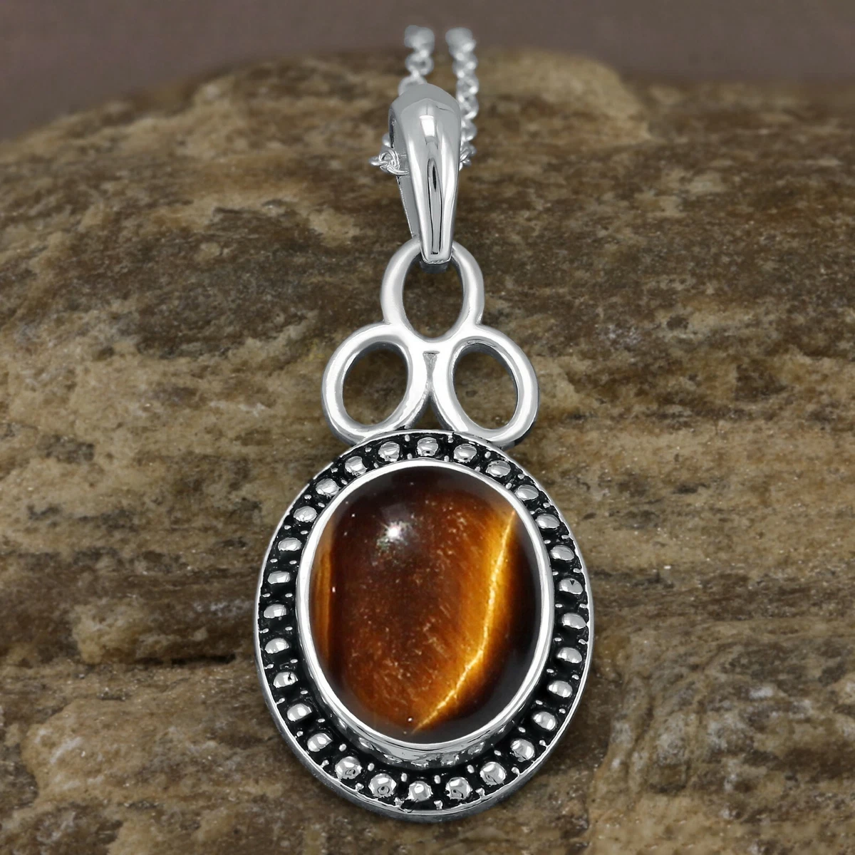 Sterling silver tiger store eye pendant