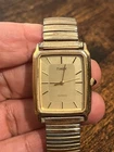 Vtg 1980's Timex Quartz Gold tone Men's watch Dress 26mm NEW BATTERY Collectible