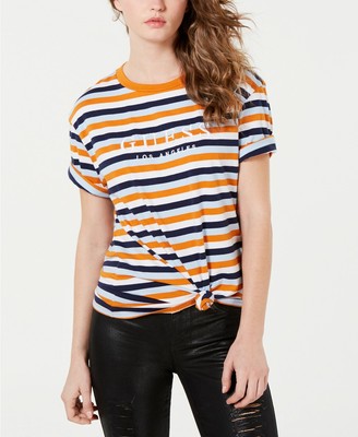 orange and blue guess shirt