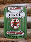 VINTAGE TEXACO PORCELAIN SIGN OLD 1934 GUN OIL FIREARM RIFLE LUBE TEXAS COMPANY