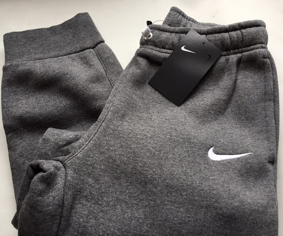 grey nike tracksuit bottoms junior