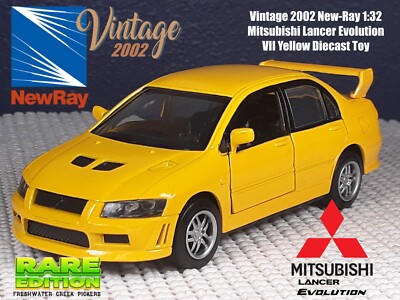 Vintage 2002 New-Ray 1:32 Mitsubishi Lancer Evolution VII Yellow