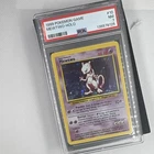 Wizards of the Coast 1999 Pokemon Mewtwo Base Set Holo Rare #10 PSA 7 EN