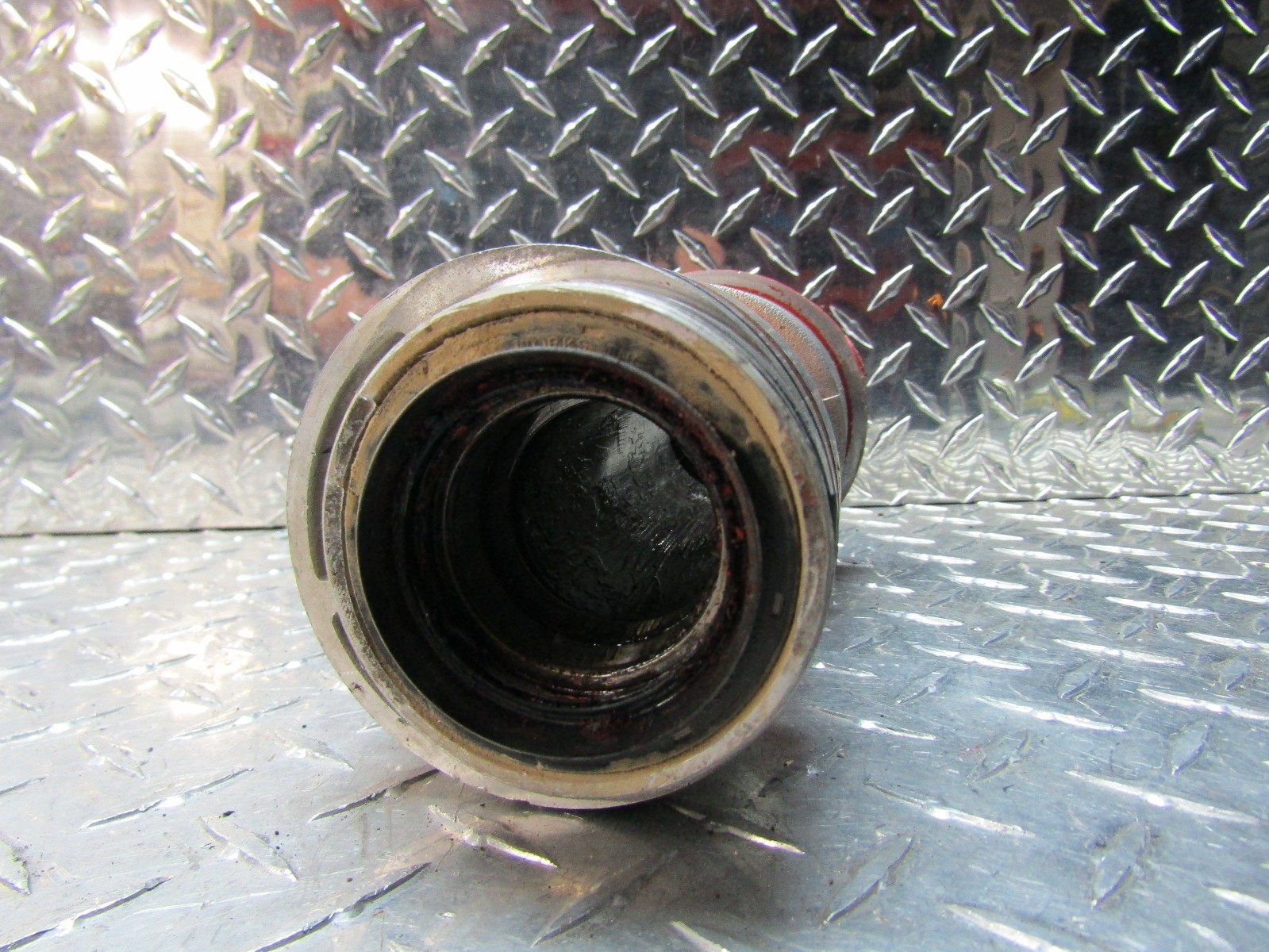 0611 YAMAHA RAPTOR 700 YFM 700 REAR AXLE BEARING CARRIER HUB ASSY GOOD