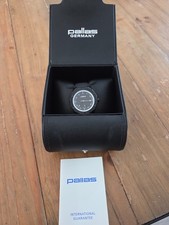 Montre Pallas modèle rare, noire et blanche, état neuf, jamais portée