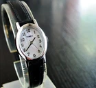 VINTAGE TIMEX ELEGANT OVAL PEARL DIAL QUARTZ WOMEN'S SILVER BLACK DRESS WATCH