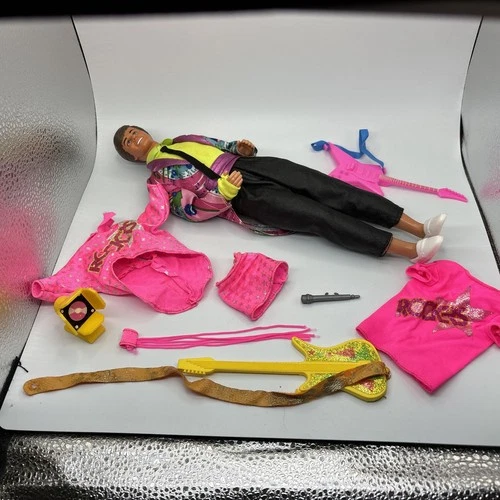 Vintage Barbie and the rockers Ken Doll with extra Barbie outfit and accessories
