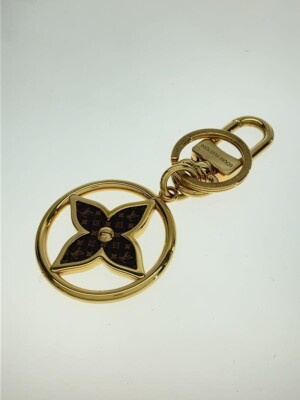 Louis vuittonキーリング LOUIS VUITTON Puzzle Flower Monogram Key Ring Bag Charm Gold