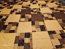 Hand Quilted Baby Quilt new the size is 37 inches long X 42 inches wide .