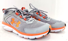 UNDER ARMOUR ASSERT kids Youth lace up athletic shoe size 5 Y gray fabric upper
