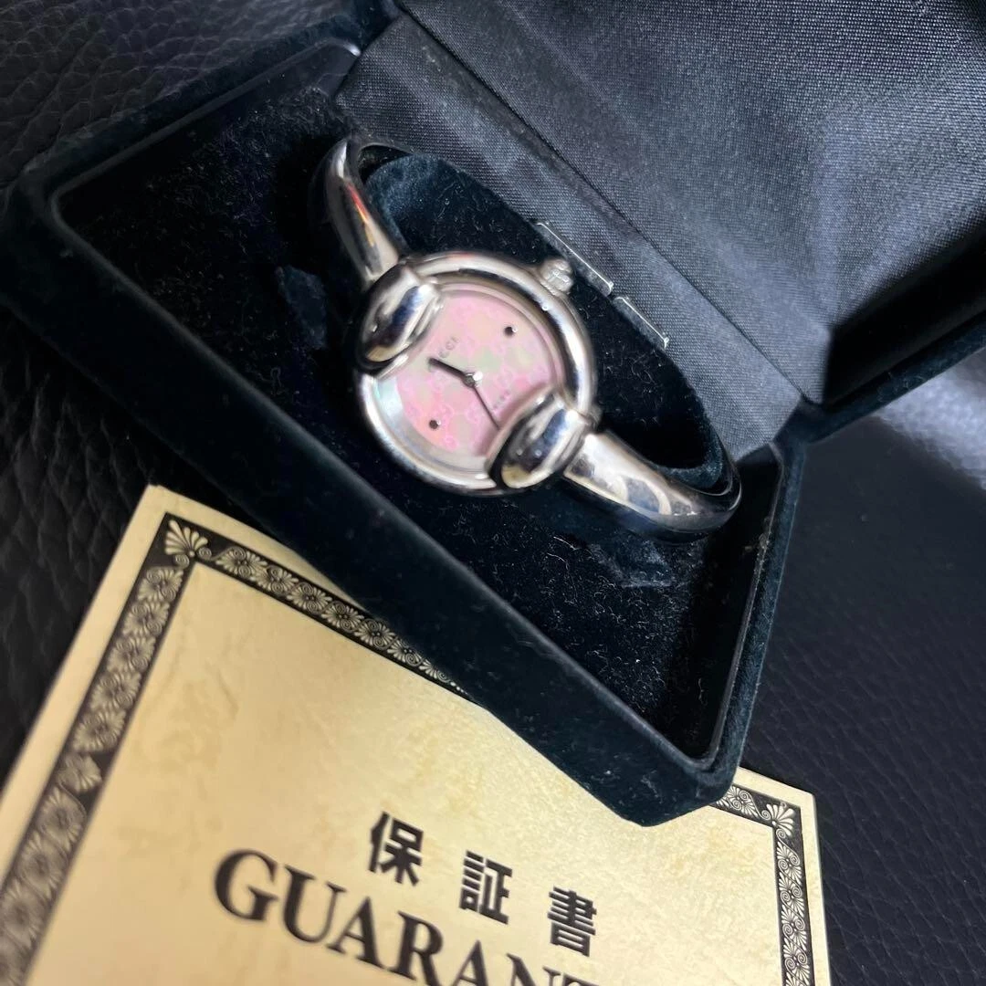 Montre femme GUCCI 1400L rose nacre motif GG quartz acier inoxydable