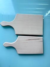 Tabla de madera natural con mango