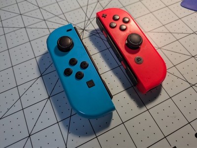 2 Nintendo Switch Joy Con Controllers L+R Neon Blue Neon Red Tested Working OEM