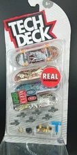 Tech Deck Real Skateboards Ultra DLX 4-Pack Fingerboards W/ Accessories