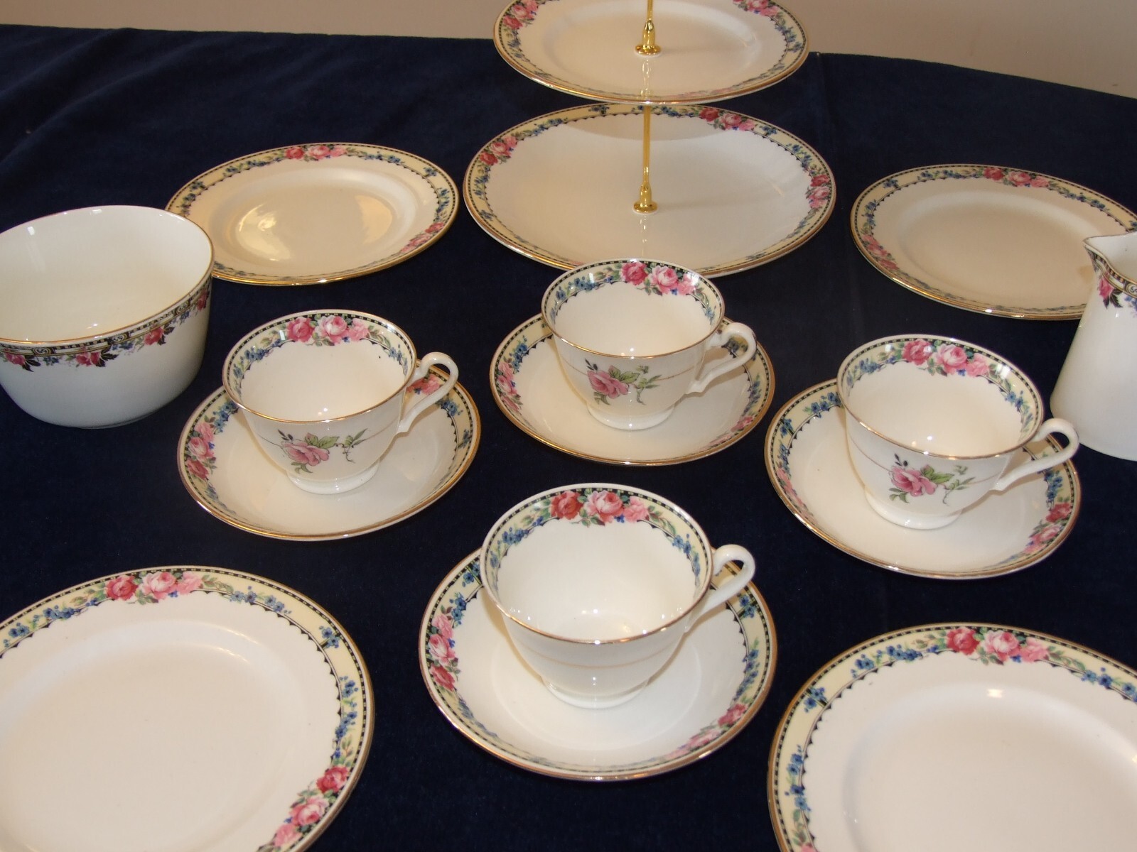 H.J.COLCLOUGH TEA SET CONSISTING OF 4 TRIOS, AND A CAKE STAND CIRCA