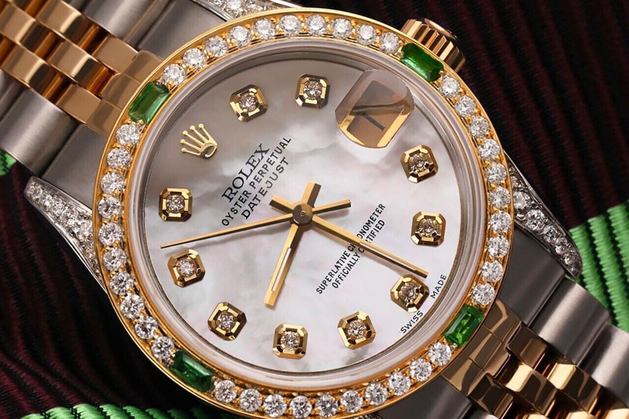 Ladies Rolex Datejust 31 mm White Mother Of Pearl Dial Diamond & Emerald Watch