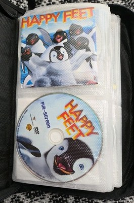 Lot of 37  Kids  Movies on DVD in Binder - No Cases -Disney, Dream Works, Pixar
