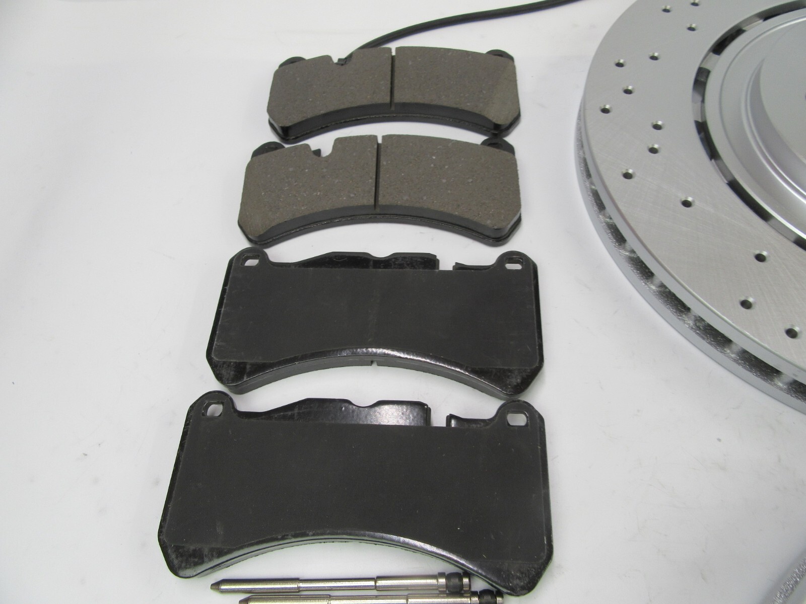 Maserati Ghibli Quattroporte front brake pads & rotors FREE OIL FILTER TopEuro