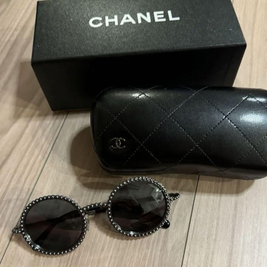 CHANEL Pearl Accented Luxury Sunglasses with Timeless Elegance