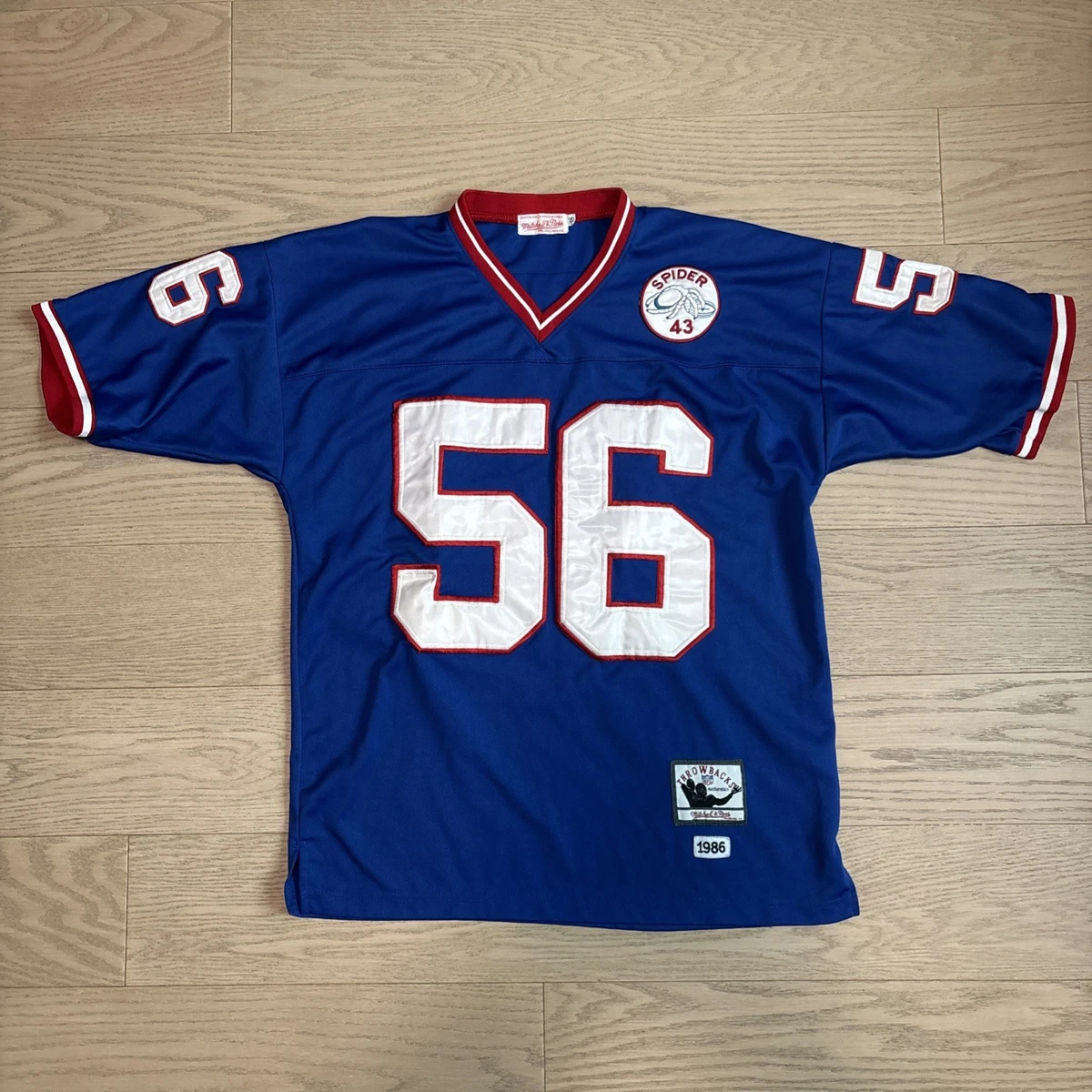 Preços baixos em Mitchell & Ness New York Giants Roupas e