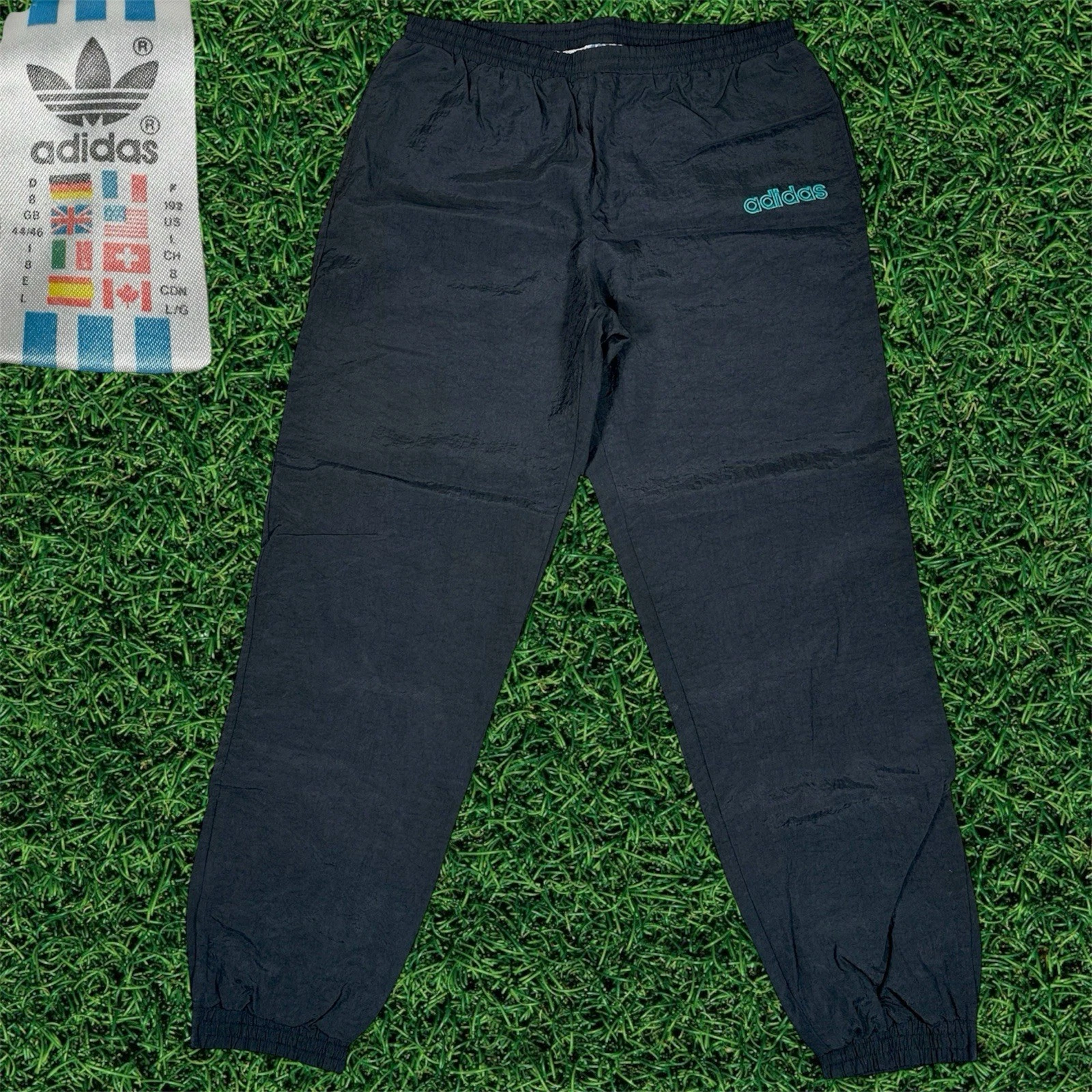 Vintage 90’s Adidas Track Pants Teal Spell Out Logo Lined Ankle Zip Black Size L