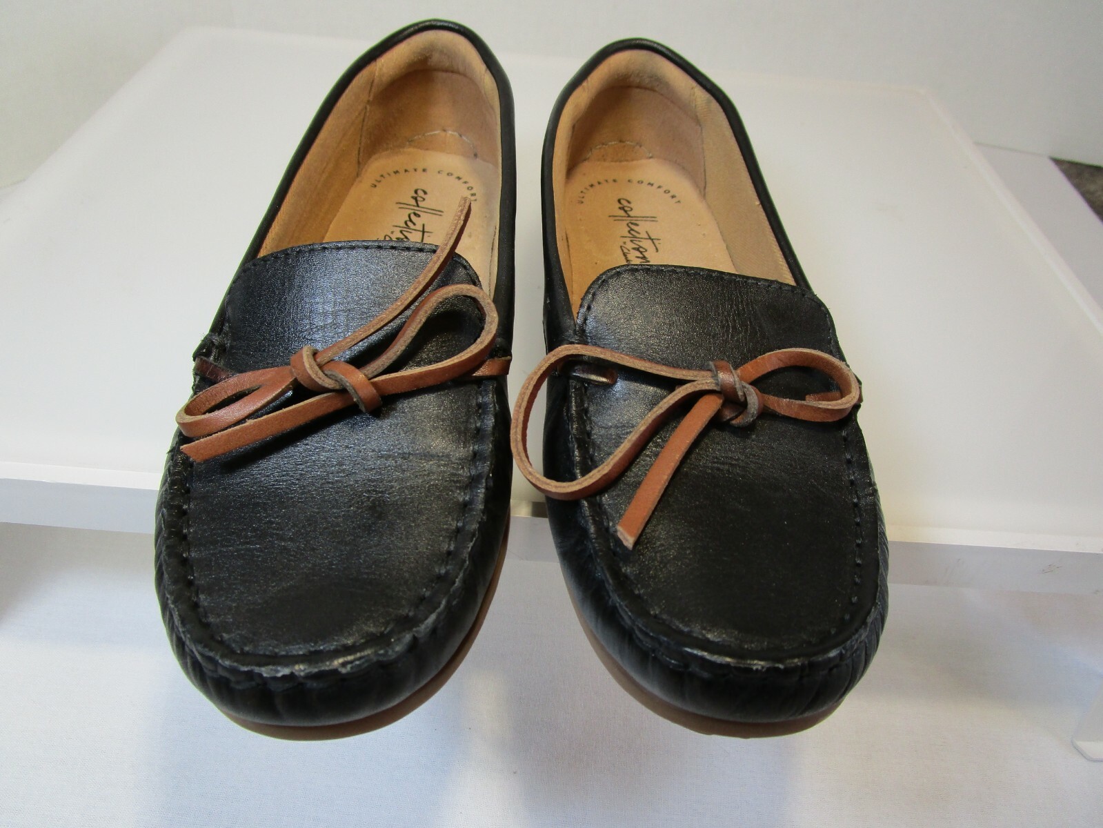 clarks black slip ons