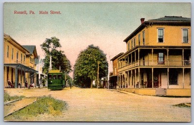 K11/ Russell Pennsylvania Postcard c1910 Main Street Stores Trolley  310