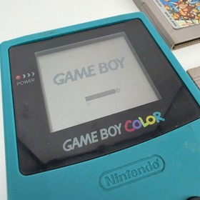 Nintendo Game Boy Color Teal Console Bundle with 13 Games and Cases
